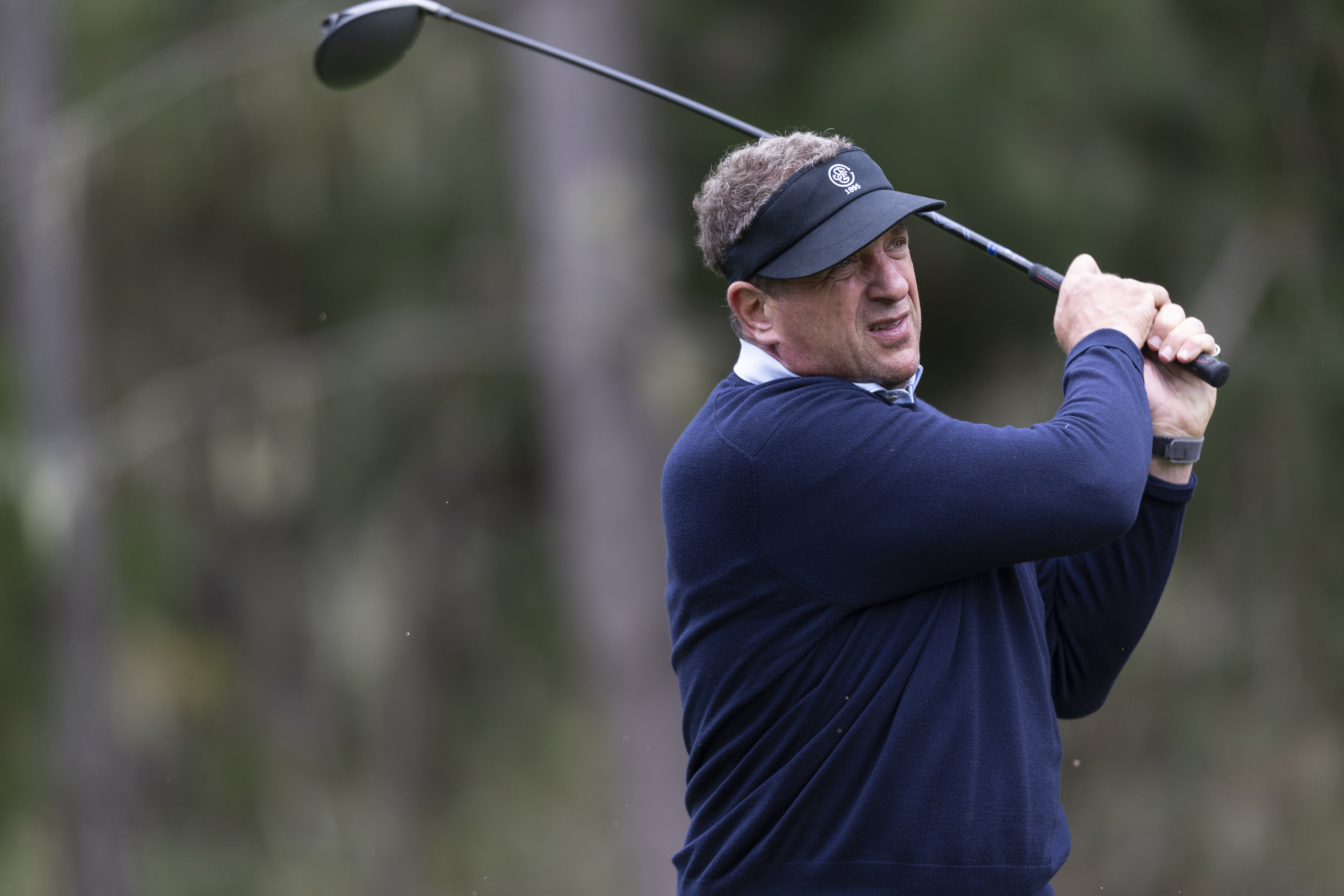 Harris Barton holds his finish on a drive