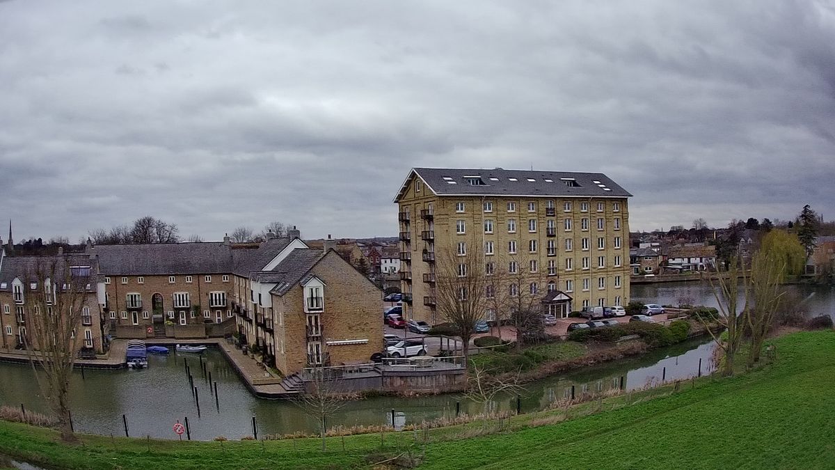 Ruko F11GIM2 Drone Example Image - close up of aerial view of town's riverside.