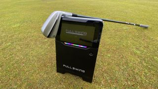 Photo of the TaylorMade P-UDI Utility Iron and FullSwing KIT launch monitor