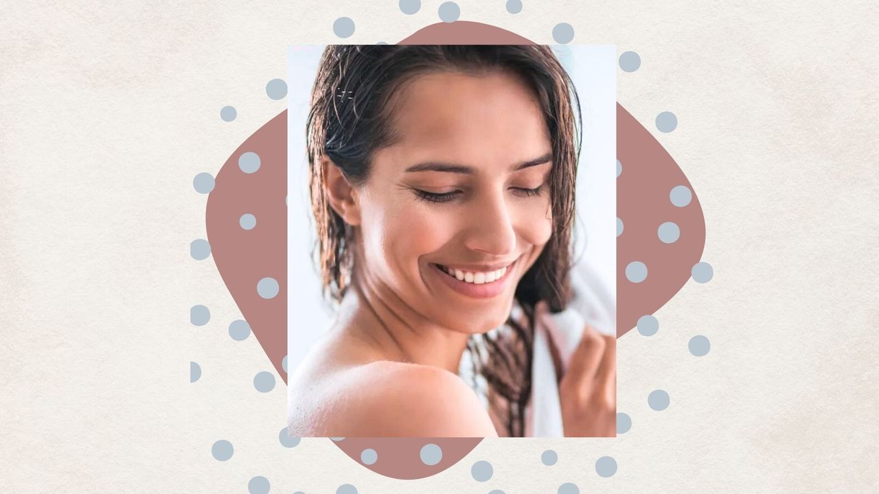 A beige backdrop with blue polka dots on it and an image of a woman with brown, wet hair towel drying it