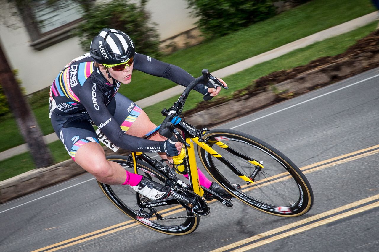 Claire Rose (DNA) goes off the front by herself. \