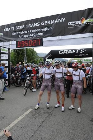 A few riders pose for an unusual photo at the start.