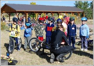 A group of kids participates in IMBA's annual Take a Kid Mountain Biking Day