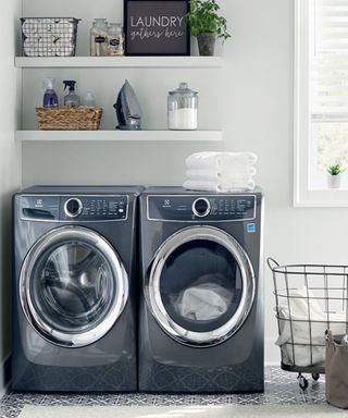 Washer dryer combo in a bright modern laundry room
