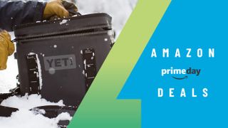 Person opening Yeti soft-sided cooler in snow