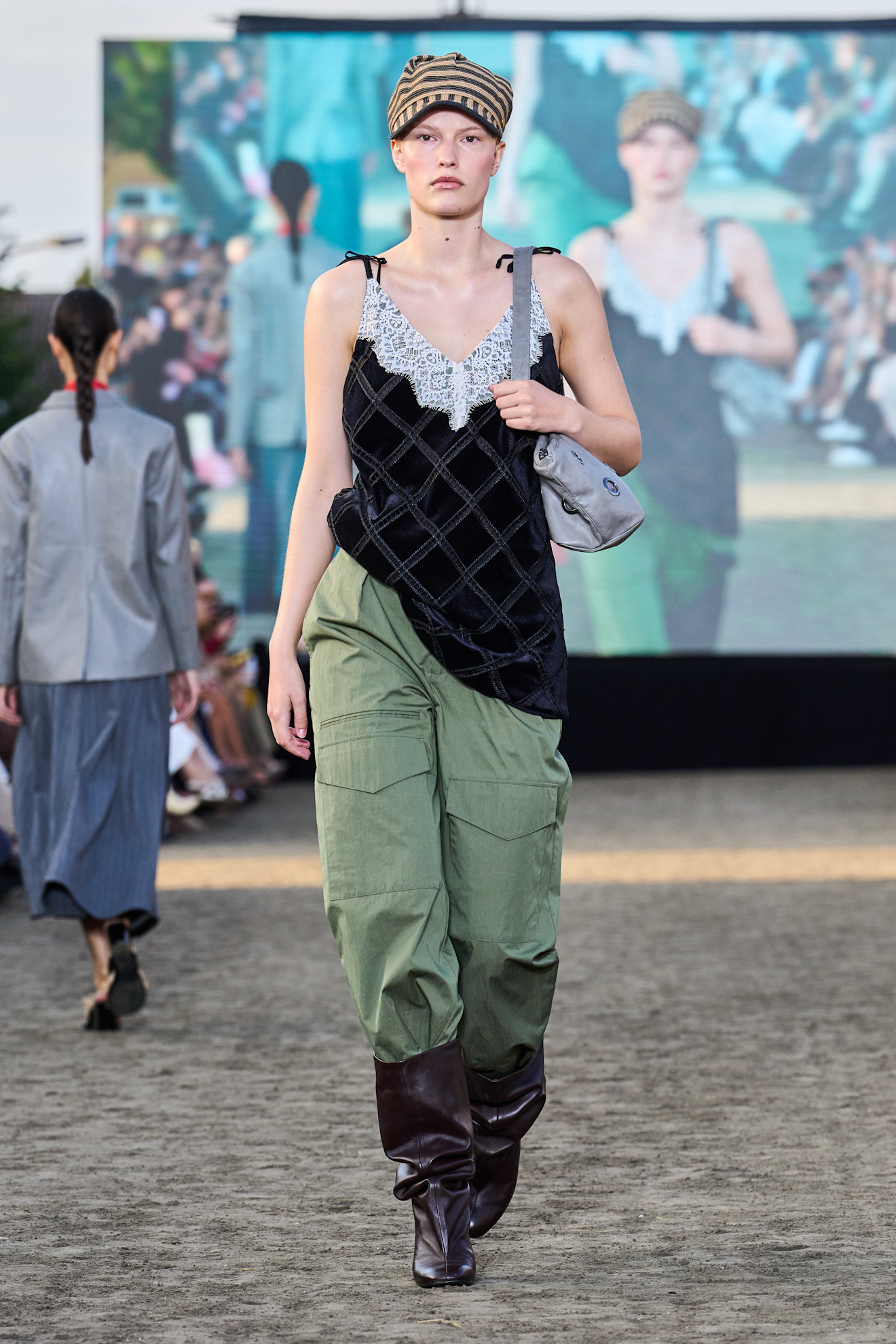 Baum Und Pferdgarten model wearing riding boots.