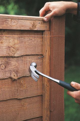 how to install fence panels: attach fence panels