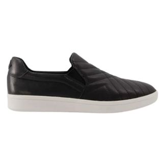 black plimsolls with white soles