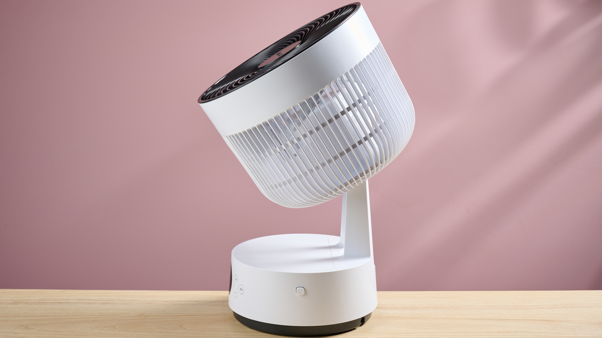 The air circulator has been angled upwards, giving easy access to the battery compartment.