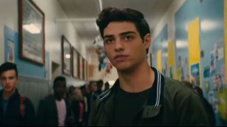 Peter defending Lara Jean in the high school hallway