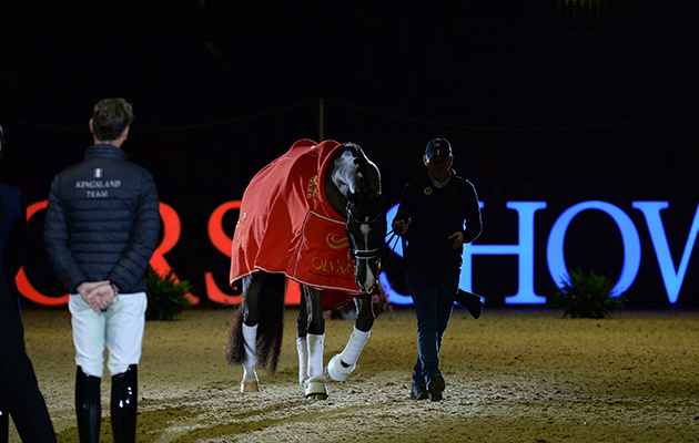H&H Groom of the Year Alan Davies leads Valegro out into the arena before his farewell ceremony