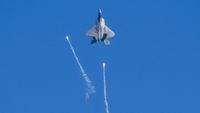 an F-22 Raptor firing flares