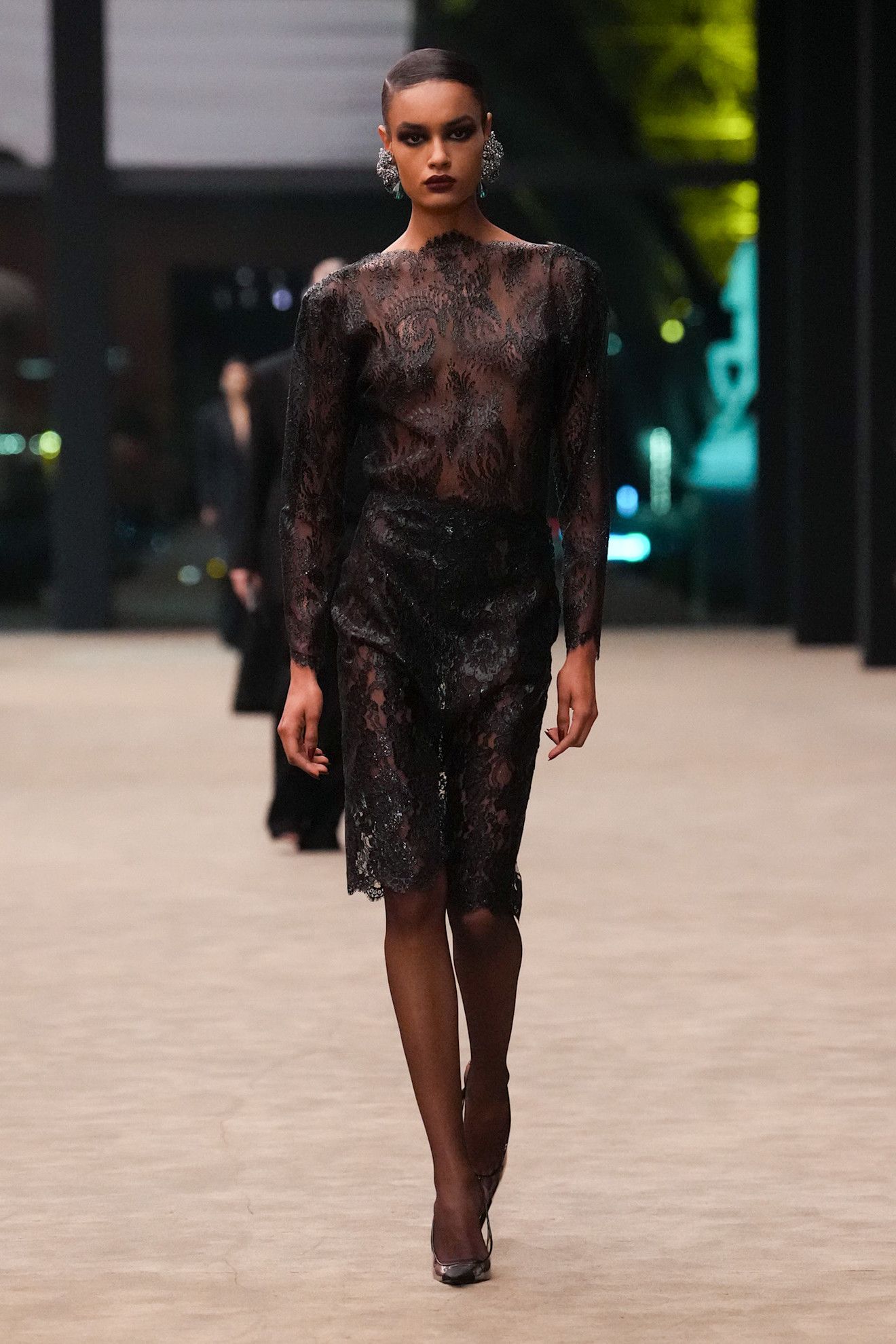Saint Laurent model walks the fall/winter 2026 runway during Paris Fashion Week