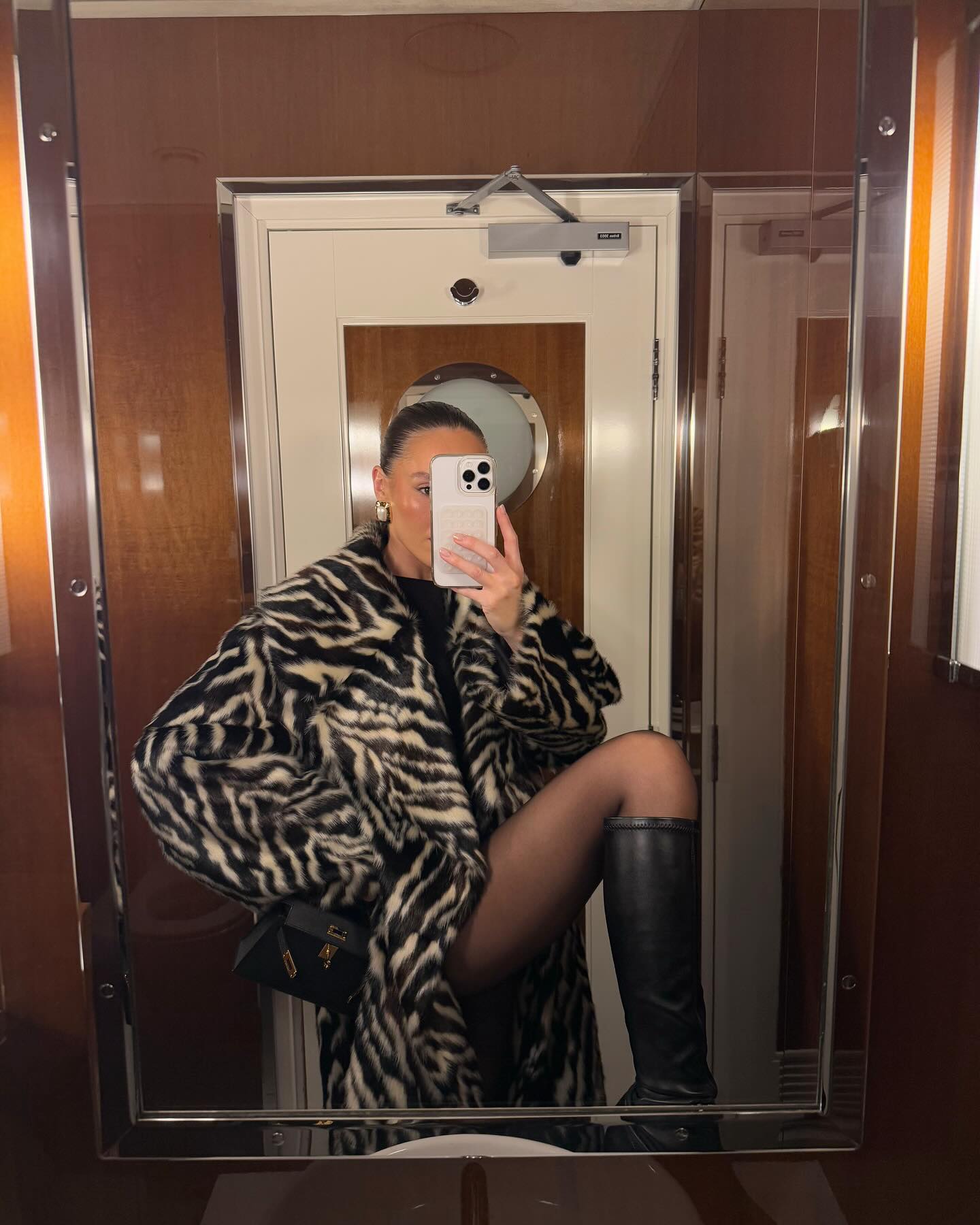 An image of @emmaleger wearing zebra print, one of the biggest animal print trends of 2026.