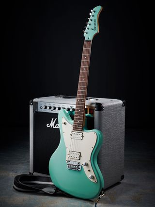 A Fernandes JG-40 electric guitar and Marshall combo amplifier.