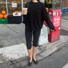 Our editor wearing a J.Crew rollneck sweater.