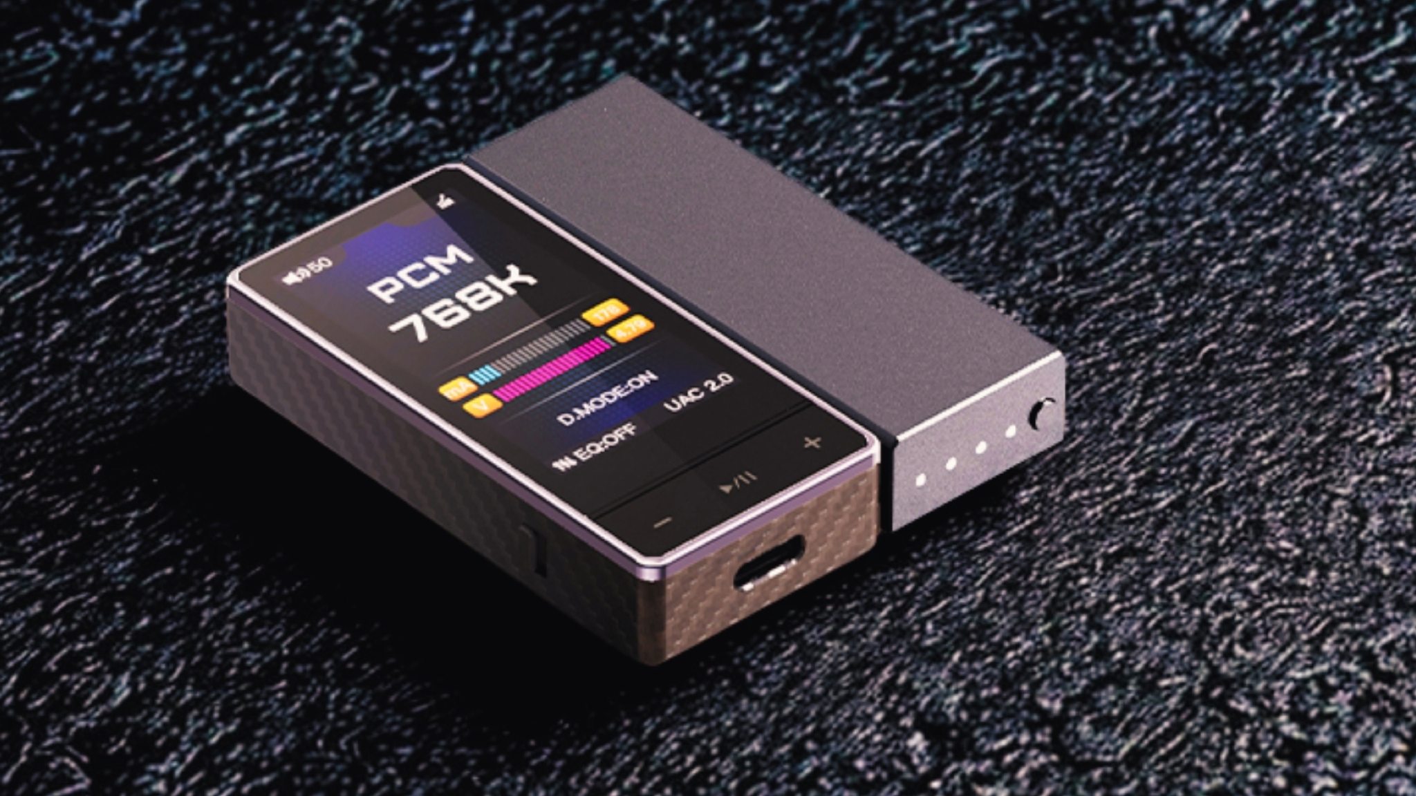 A photograph of the FiiO QX13 on a dark background with the optional e-stick battery pack attached