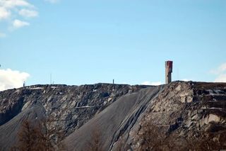 a wide shot of an iron mine