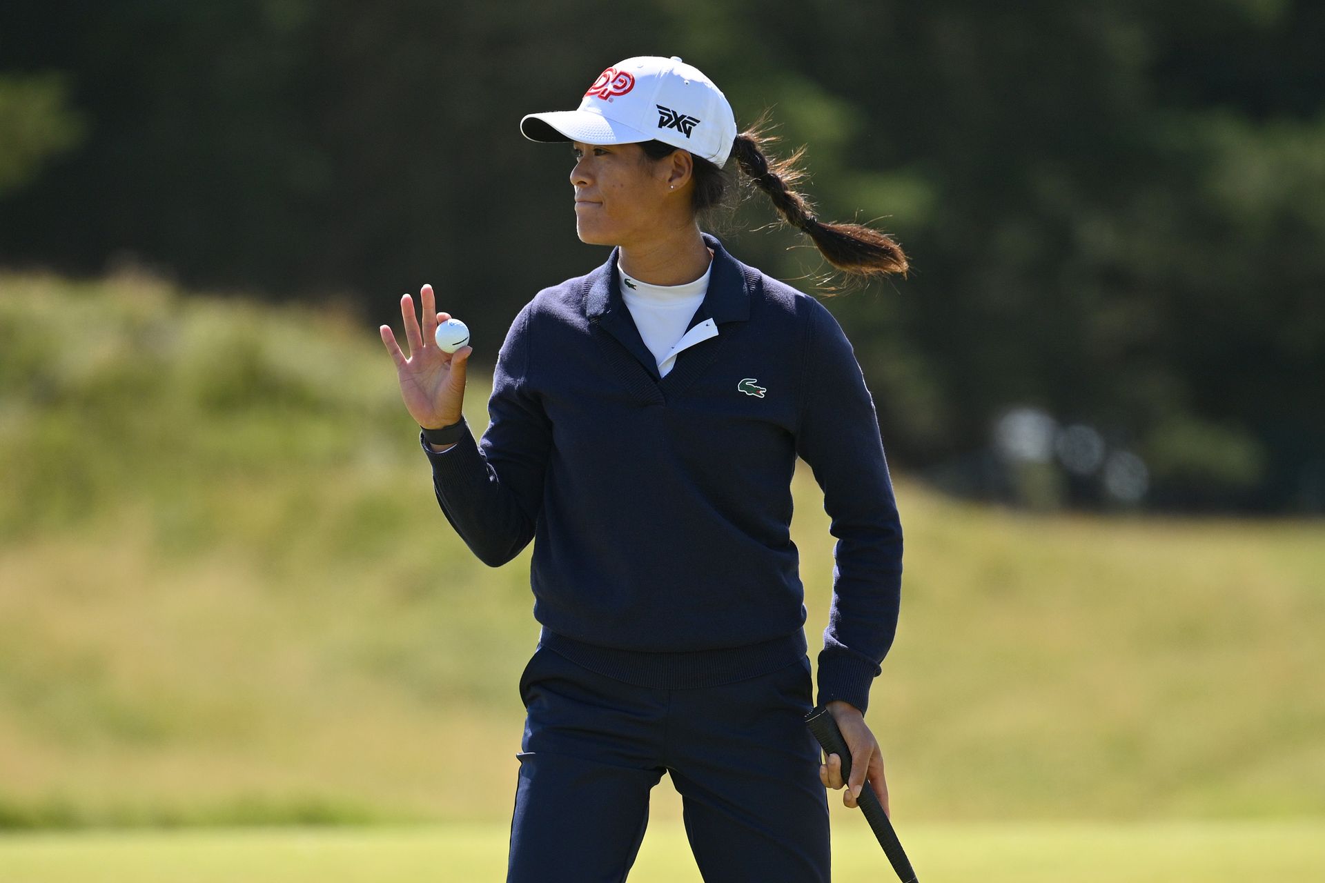 Celine Boutier waves to the crowd