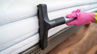 Use a vacuum cleaner for the first step in cleaning your mattress