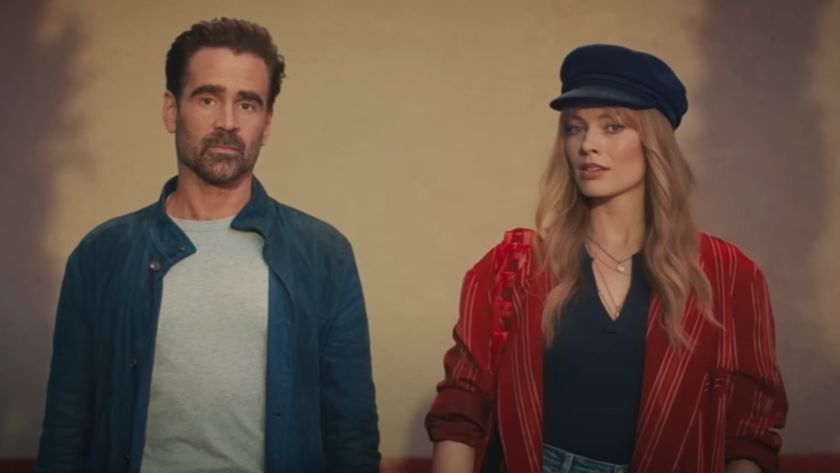 From left to right: Colin Farrell and Margot Robbie looking forward in A Big Bold Beautiful Journey.