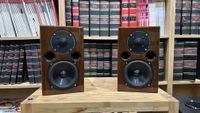 Acoustic Energy AE1 40th Anniversary speakers on wooden rack in test room