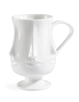 Face motif white mug.