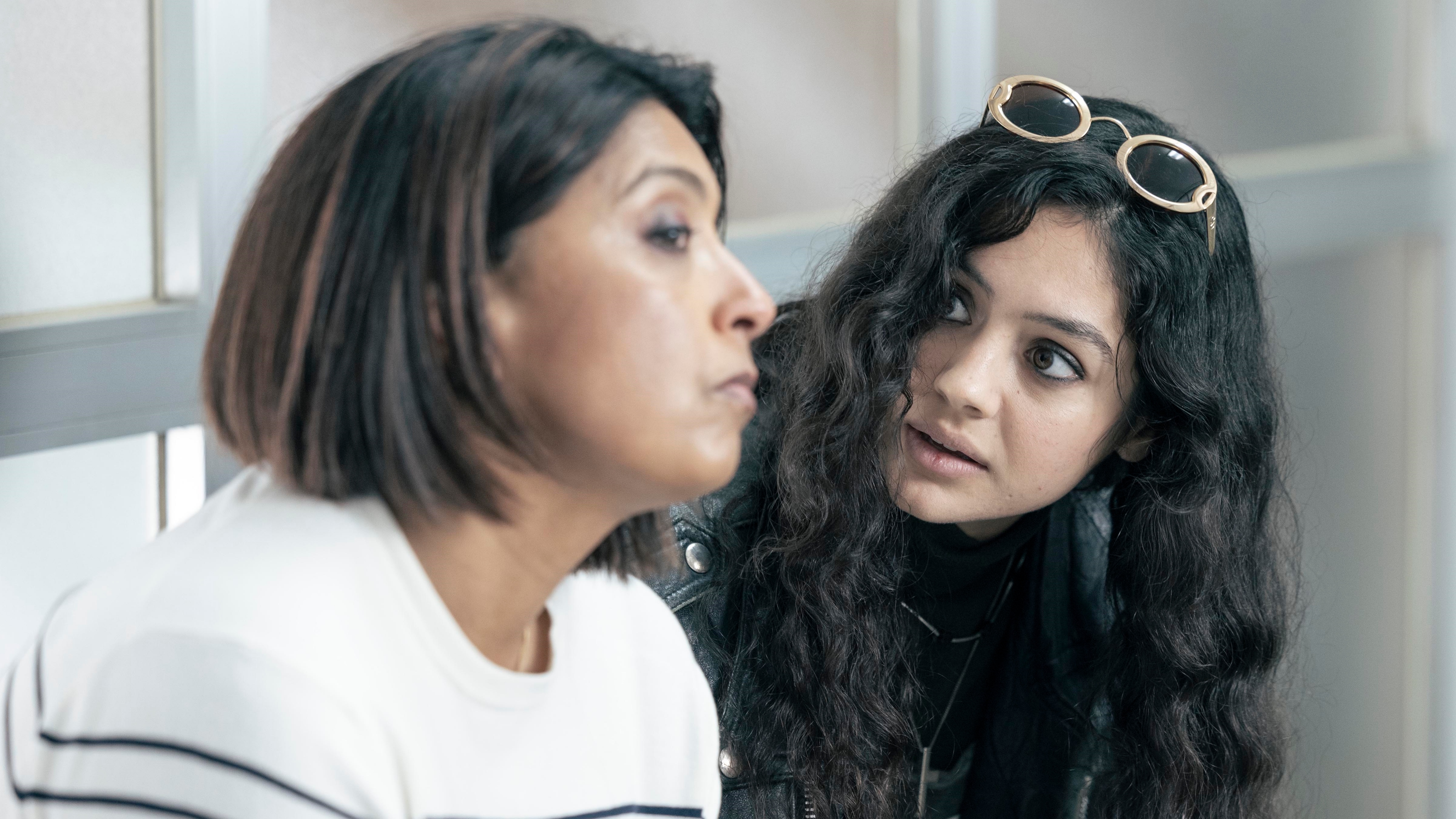 Margot talking to Alice as they wait for Huw at the police station