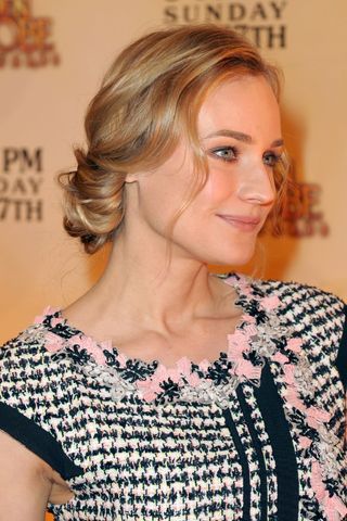 Diane Kruger with a messy bun as she poses during the 67th annual Golden Globe Awards nomination announcement held at the Beverly Hilton Hotel on December 15, 2009 in Los Angeles , California.