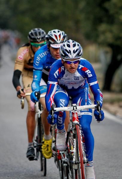 A rider from Cofidis joins the other two on a short lived break from the peloton.