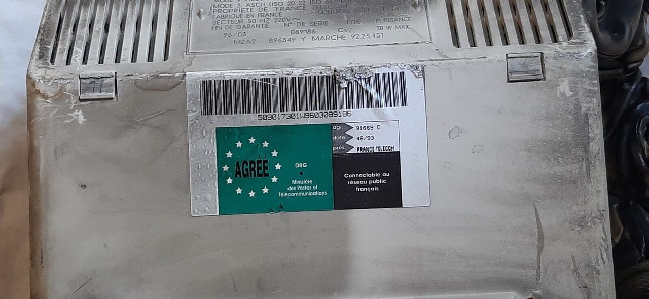 France Telecom sticker on melted Alcatel initel 2