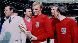 30th July 1966: England captain Bobby Moore (1941 - 1993) with the Jules Rimet trophy, following England's 4-2 victory after extra time over West Germany in the World Cup Final at Wembley Stadium. Moore was subsequently voted 'Player Of The World Cup'. (Photo by Hulton Archive/Getty Images)
