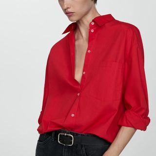 Cropped image of woman wearing red shirt 