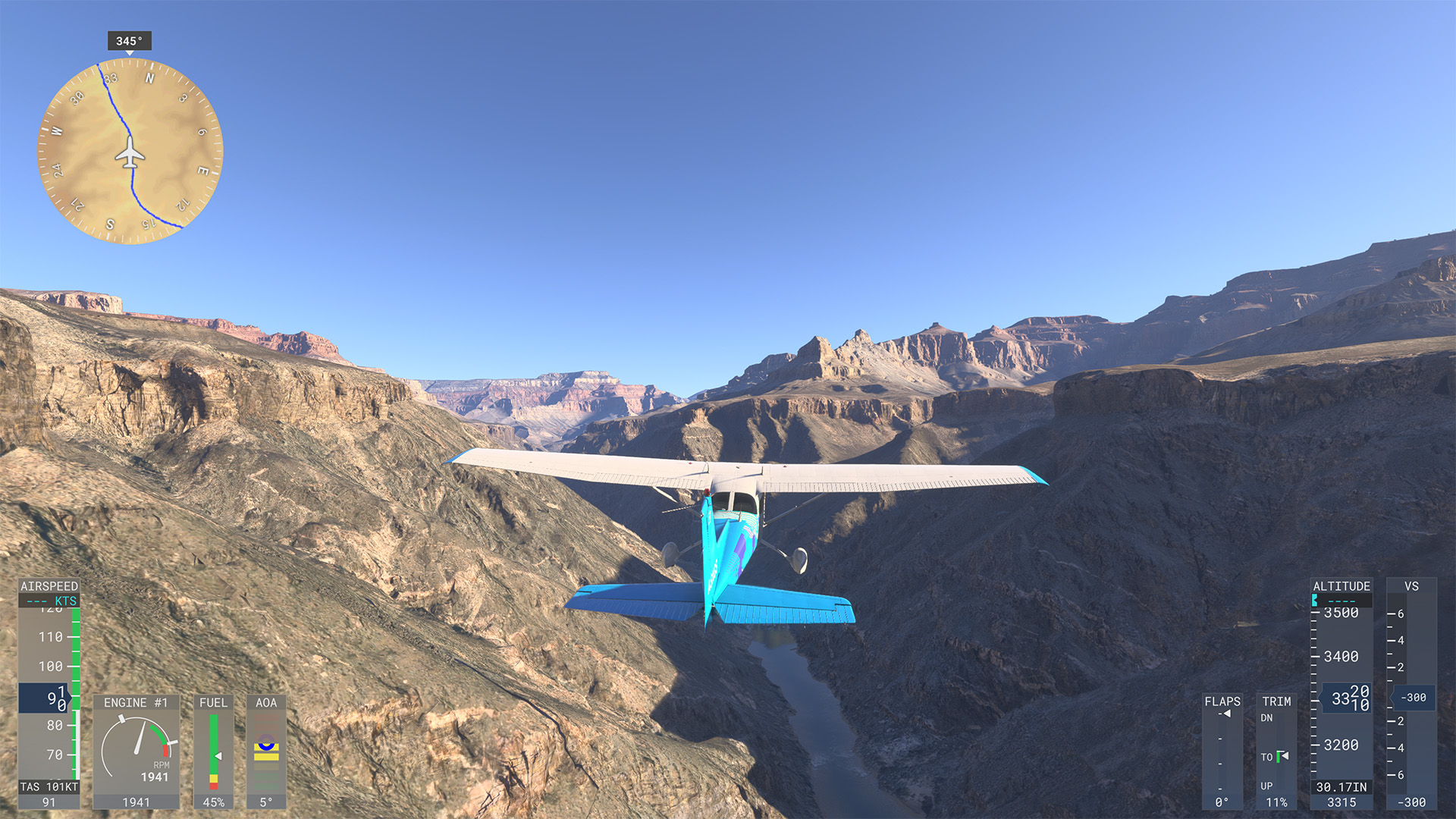 A Cessna 172 flies over the Colorado River in the Grand Canyon.