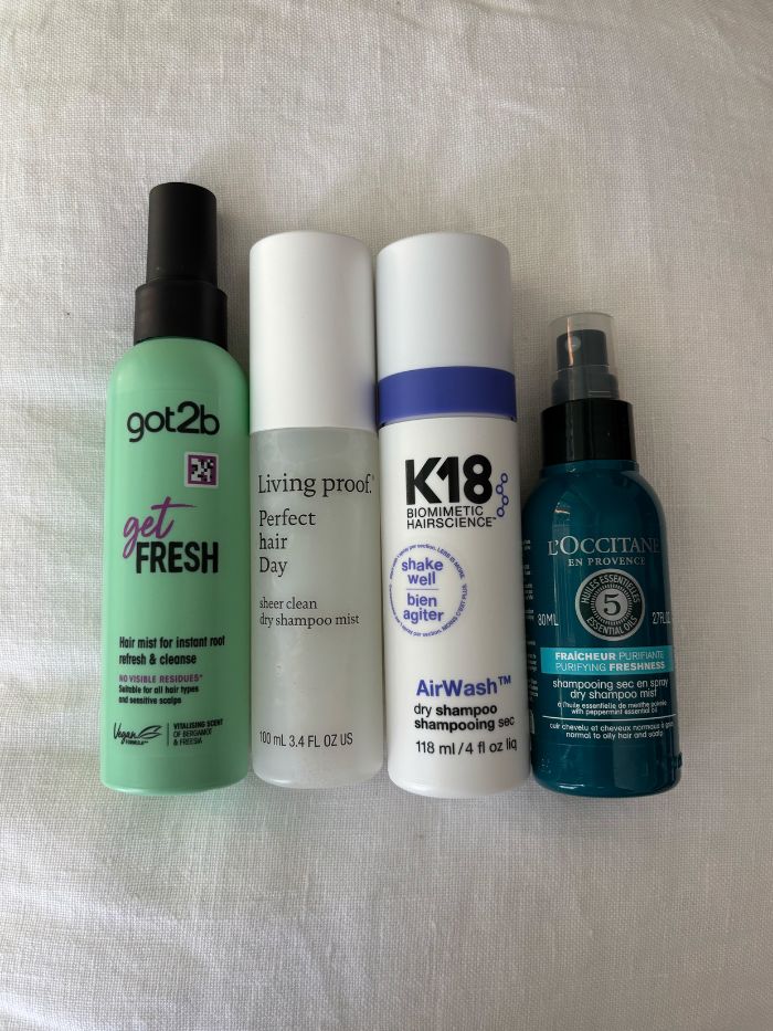 A selection of dry shampoo mists from Got2b, Living Proof, K18 and L'Occitane
