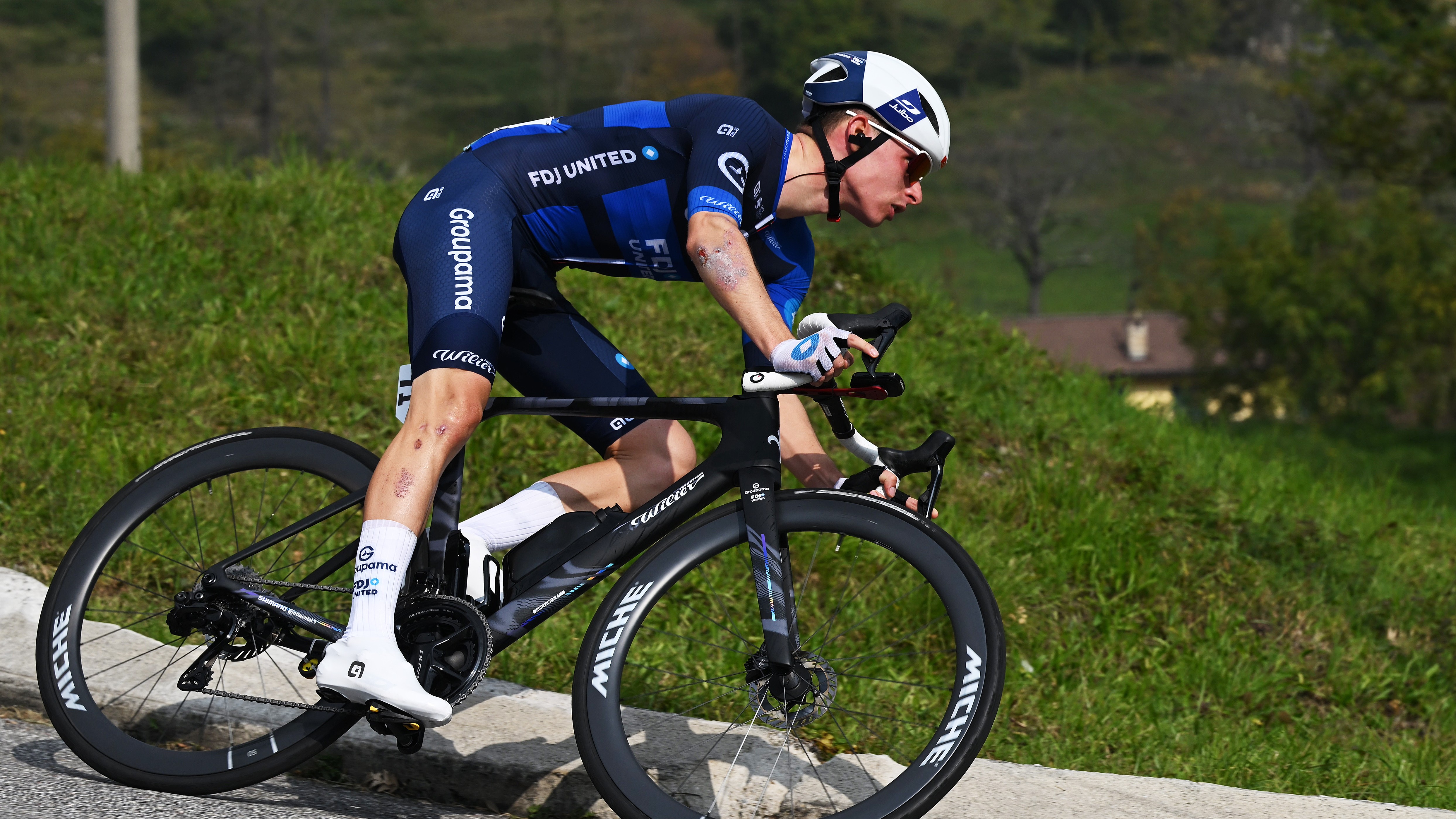 Romain Gregoire racing on a black Wilier bike 