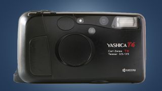 The Yashica T4 camera on a blue background