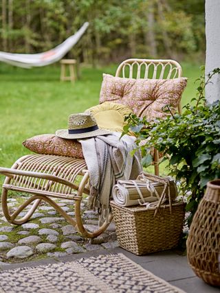 Rustic outdoor chair with cushions