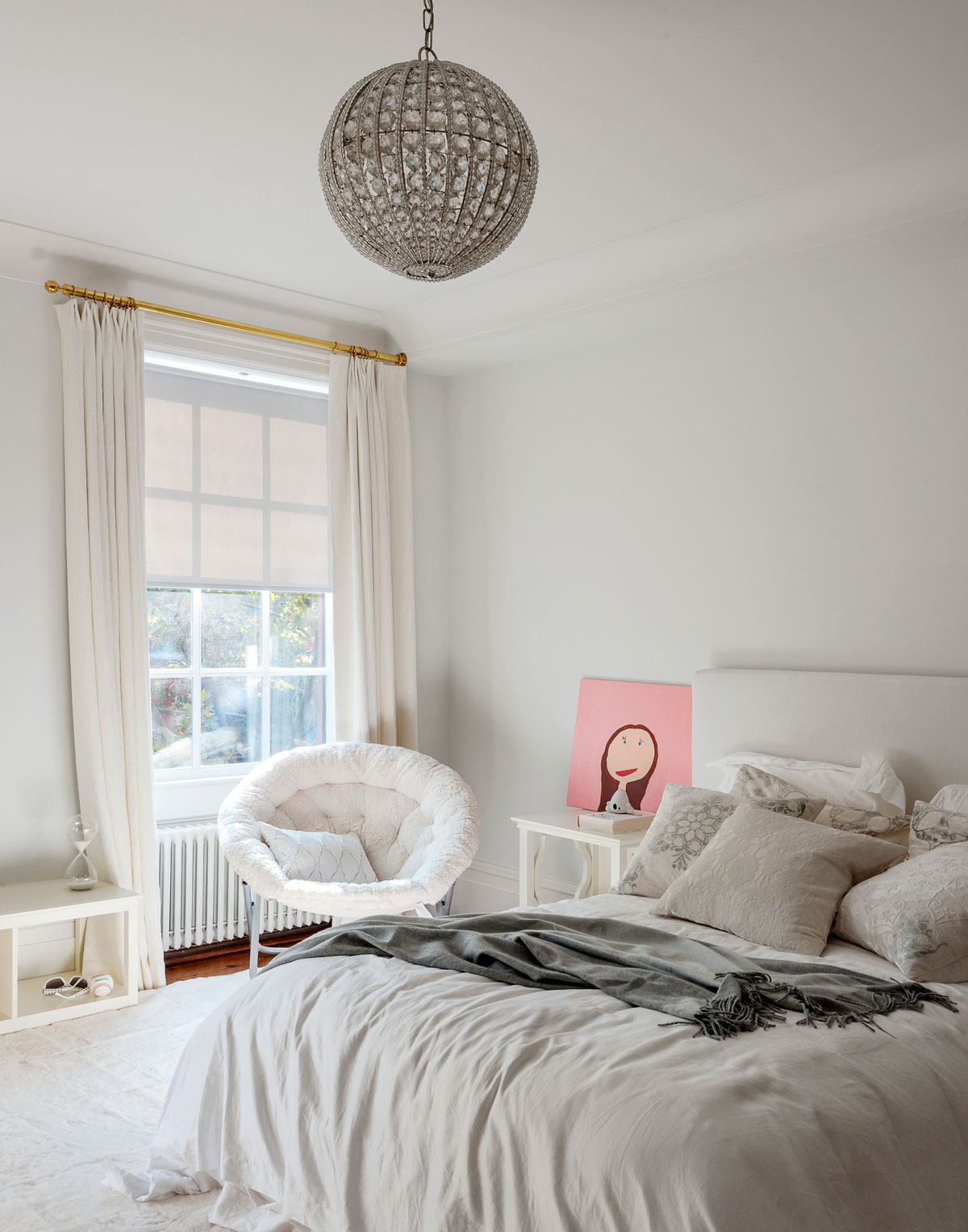 pale grey bedroom with chandelier