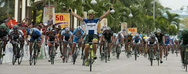 It's a hatrick: Italian Andrea Guardini (Farnese Vini) takes out his third stage into Muar after the peloton reeled the breakaway in on the home straight