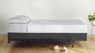 What is a mattress foundation, featuring a lifestyle image of Casper The Foundation Bed Base