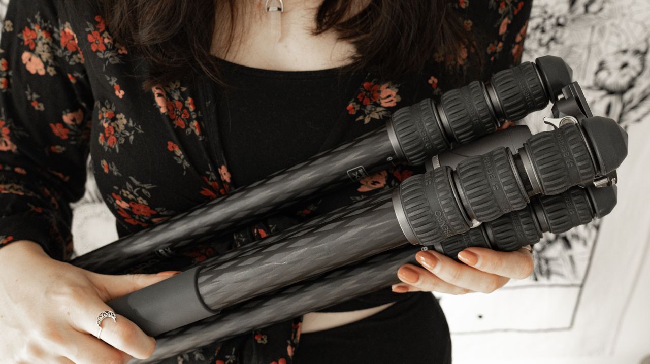 Benro Rhino travel tripod being held by the reviewer