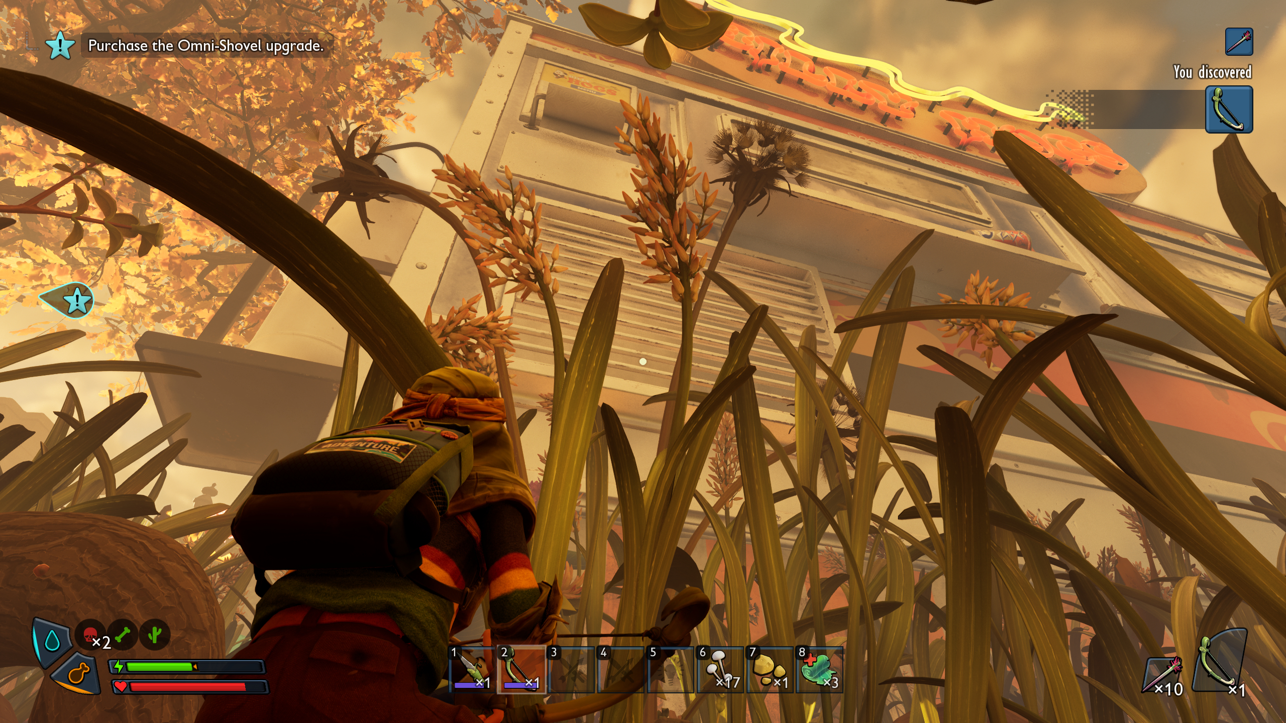 Grounded 2 grass seeds: A character crouched looking up at grass seedds in front of the Snackbar truck.