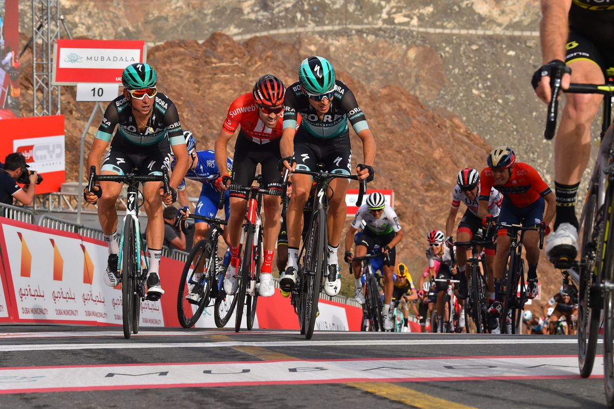 Davide Formolo and Tom Dumoulin cross the line