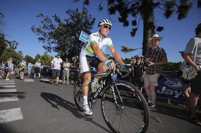 Simon Gerrans makes his way to the sign on.