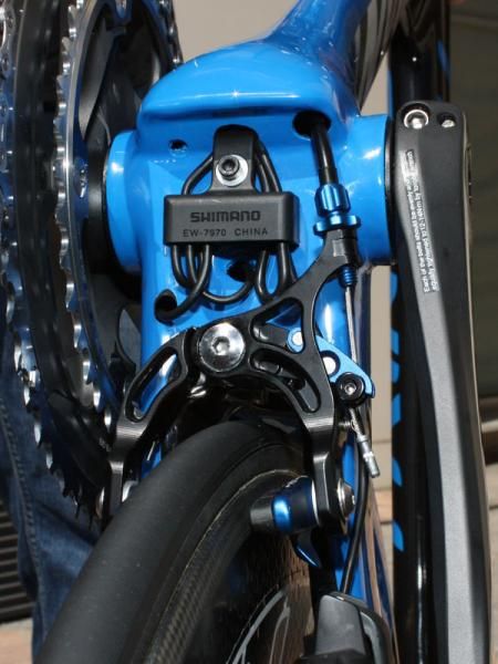 The underside of the bottom bracket is a busy area but it's already in turbulent air so it supposedly doesn't matter much.