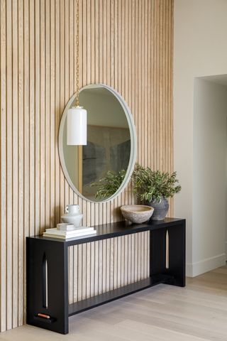 An entryway with console table
