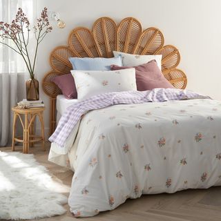 Petal cane headboard with floral bedding