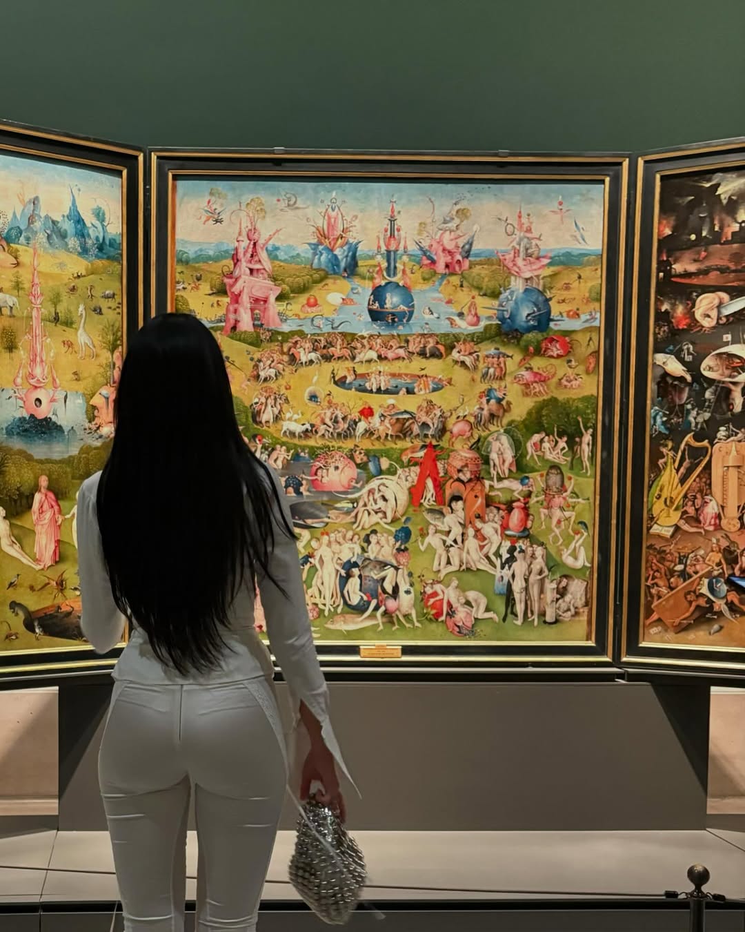 Dua Lipa wearing a white Dilara Findikoglu set at the Prado museum