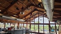 The interior and exterior of the Angry Orchard venue.